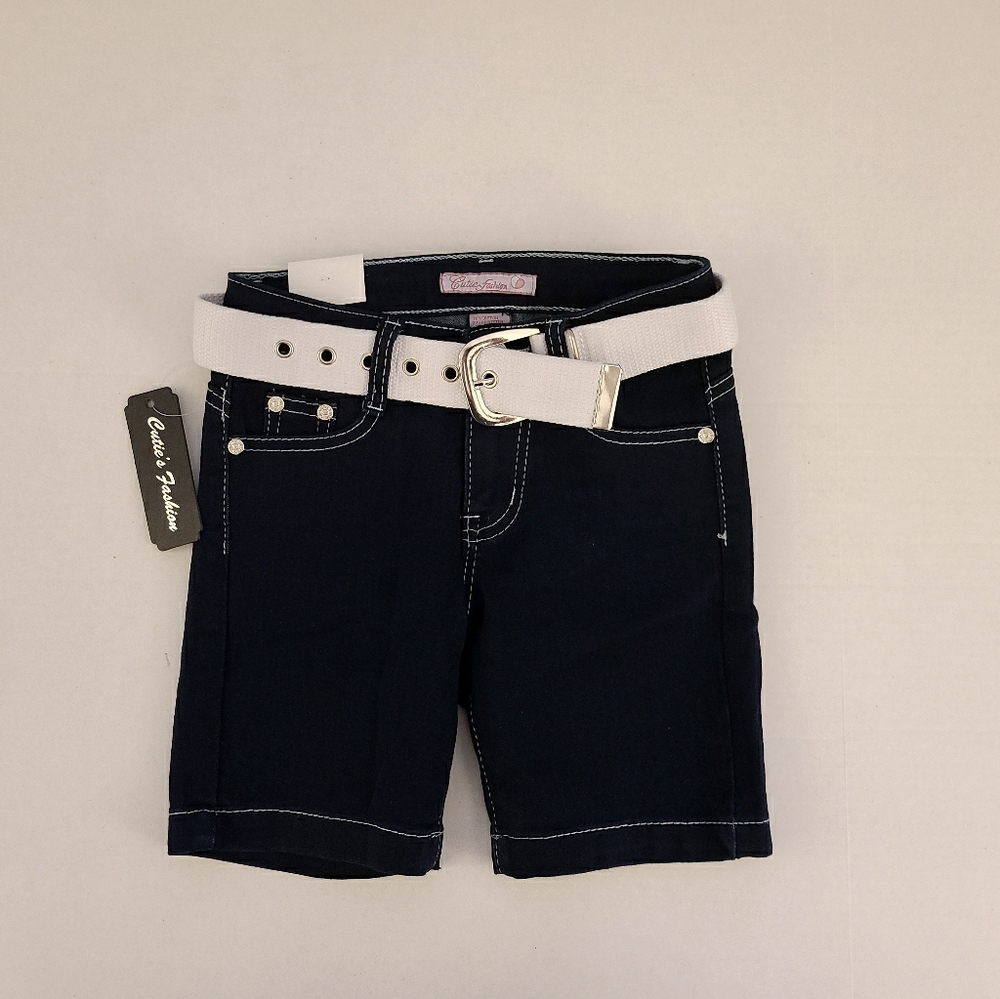 Dark wash jean shorts with white belt